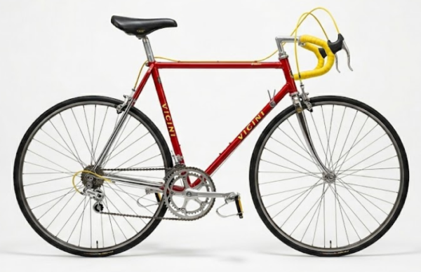 Vintage Vicini red racing bike with yellow bar tape and Campagnolo groupset