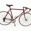 A complete side profile view of a preserved 1970s metallic bordeaux Viner Special Professional road bicycle with Campagnolo Nuovo Record groupset on a plain white background.